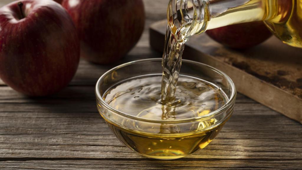 Stock image of apple cider vinegar.